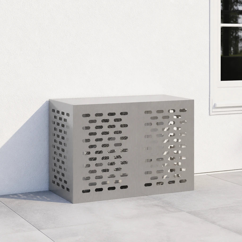 Cache climatiseur inox installé contre un mur, à proximité d'une fenêtre